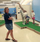 Playing miniature golf